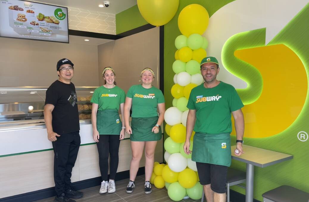 Franchisee of the West Bathurst Subway restaurant Michael Shen, with Emily Adams, Charlotte Graham and Frankie Trejos. Picture by Alise McIntosh