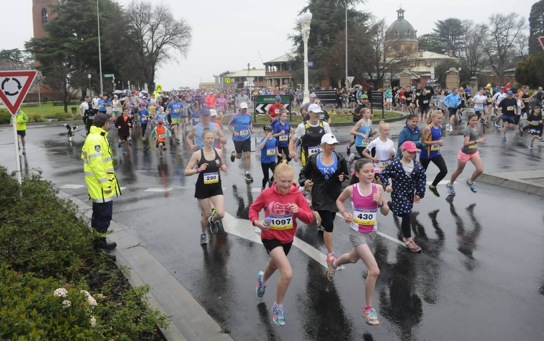 AND THEY'RE OFF: Competitors at last year's Edgell Jog, which was plagued by wet weather. Photo: CHRIS SEABROOK 