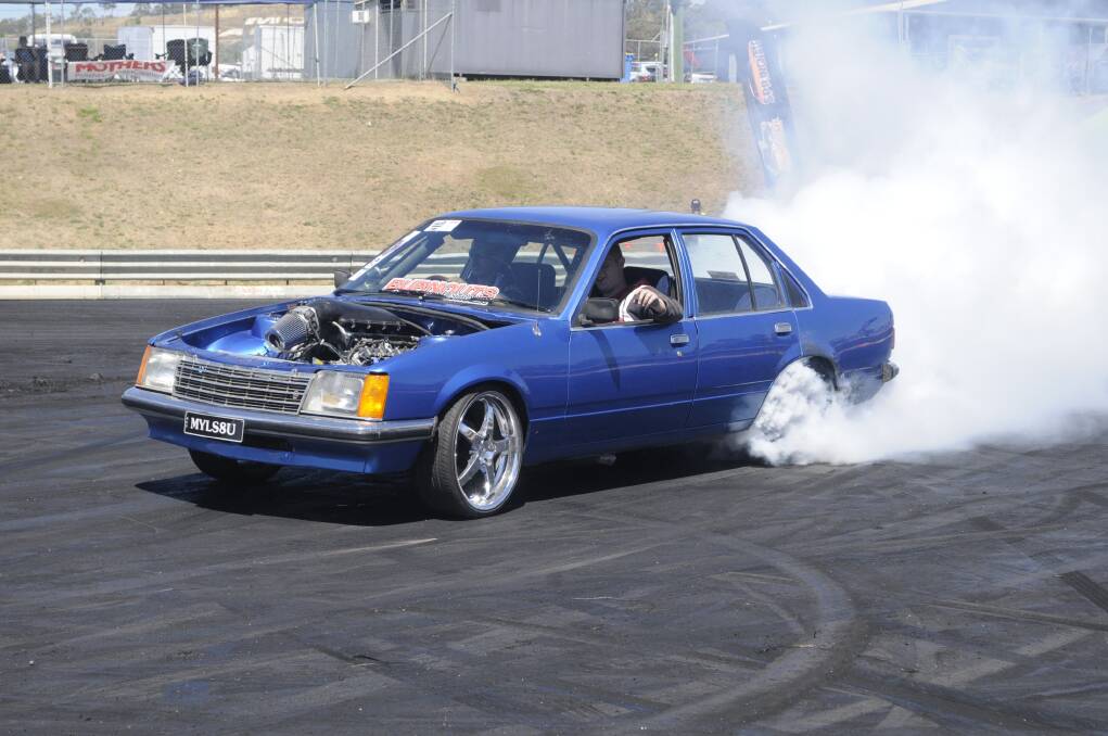 BURN OUTS: One car enthusiast enjoys his chance to drive on the iconic Mount Panorama, at Bathurst Autofest.