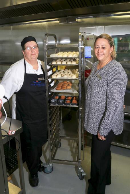 DOUBLE DELIGHT: Louise Watts and Nicole Mahara at Whiddon Group Kelso's kitchen. Whiddon Group Kelso has two nominations in the Aged Care Hospitality Awards. 092716pbcater1