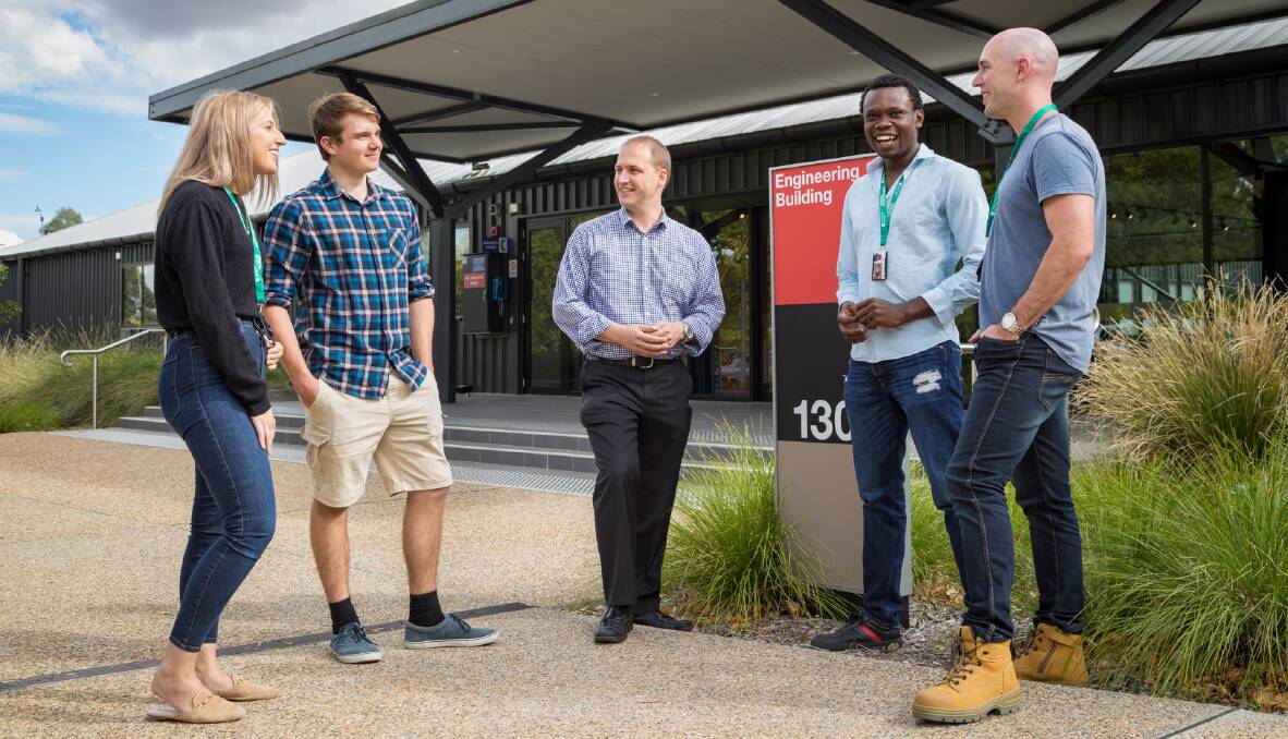 TOP FOUR: Second year engineering students Emma Zanotto, Alex Johnson, Chris Oviawe and Aaron Hollier, with Professor of Engineering Euan Lindsay (centre). Photo: SUPPLIED