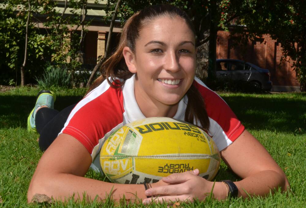TALENT: Darcie Morrison competed at the Okinawa Rugby Sevens in Japan, in early February. Photo: BRIAN WOOD 042716footy3