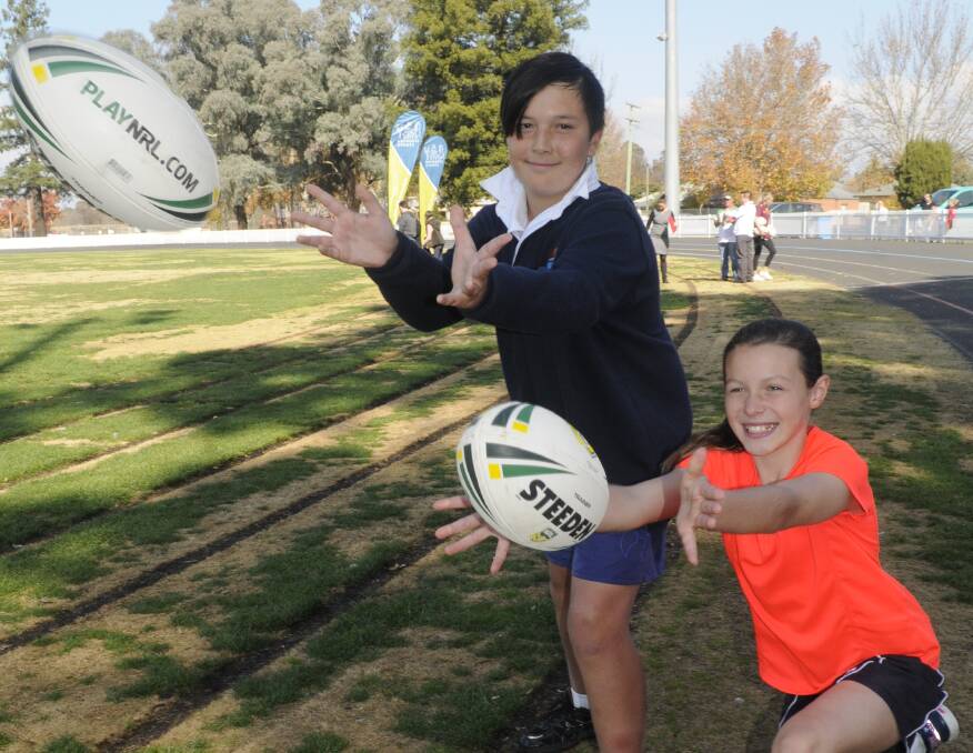 GAME ON: Ethan Goldfinch and Lucinda Chirgwin were both the winners of the ball boy and ball girl competition, for next month's Bathurst NRL game at Carrington Park. Photo: CHRIS SEABROOK 052217cballs2