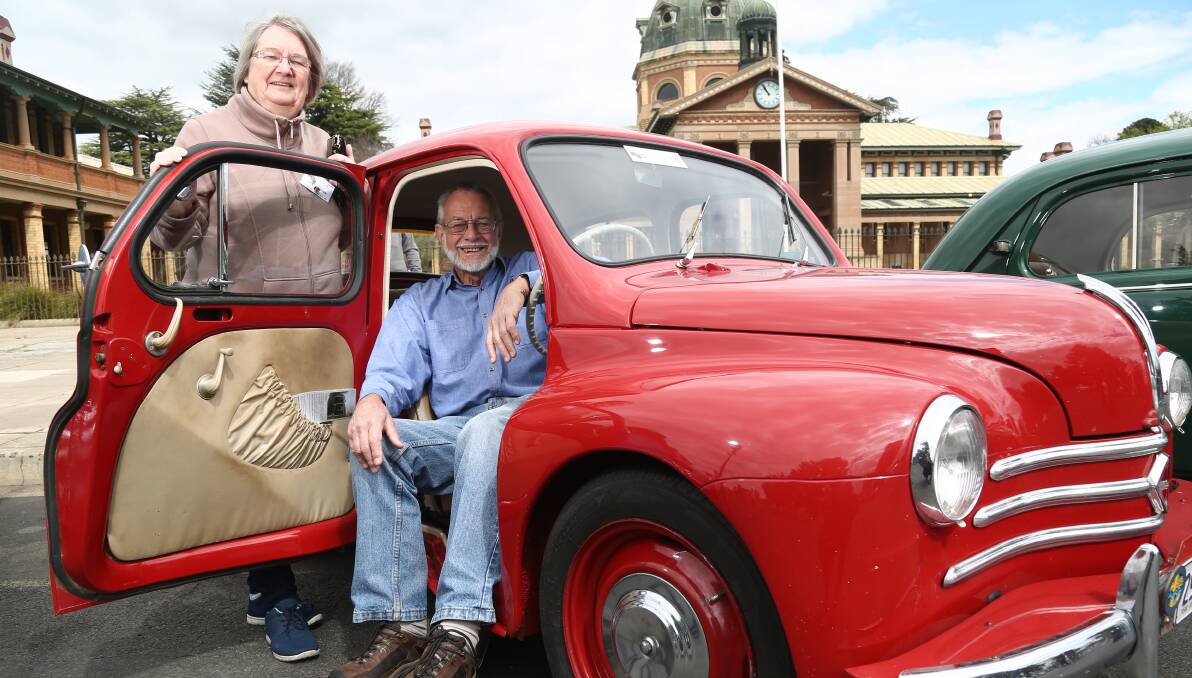 GOING FOR A DRIVE: Pauline and George Cook at the Renault 4CV display in Russell Street. Photos: PHIL BLATCH 091716pb4cv4