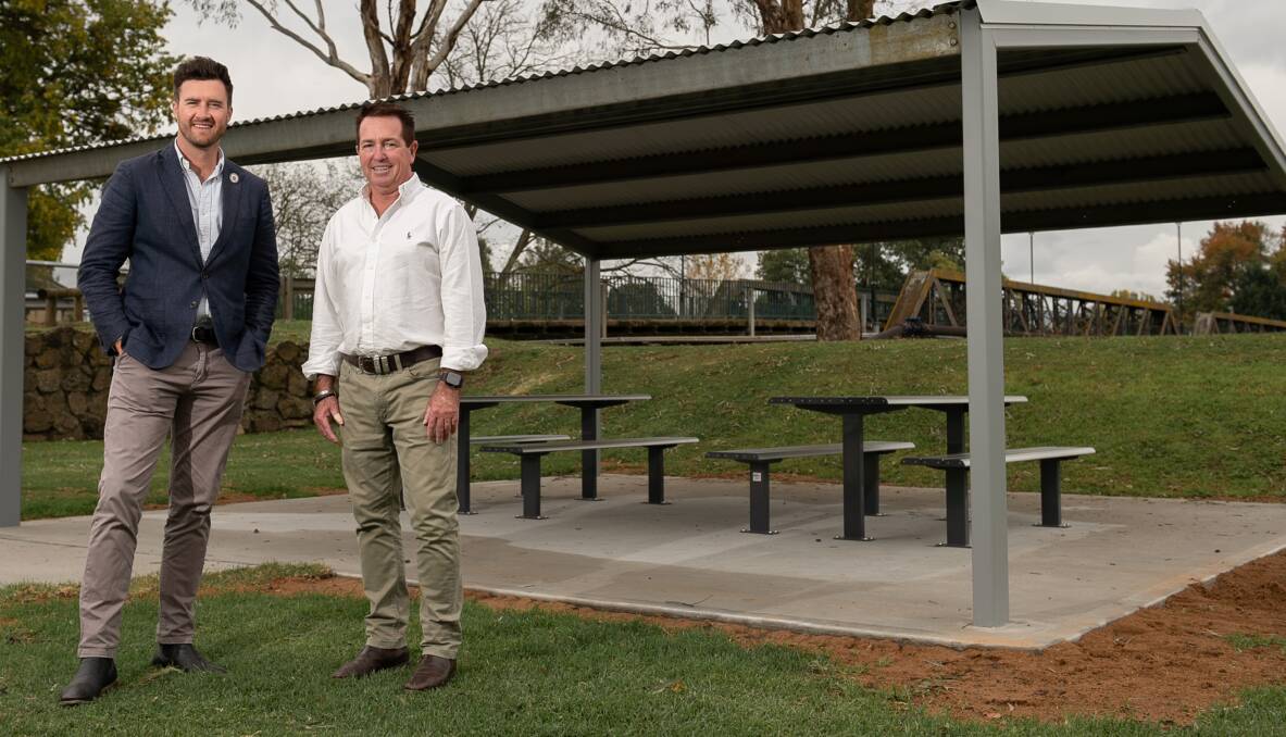 Bathurst deputy mayor Ben Fry and Bathurst MP Paul Toole standing next to the newly renovated shelter at Cousins Park. Picture by James Arrow.