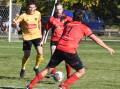 Panorama FC's Matt Hobby on the ball, with a Coniston defender in hot pursuit. Picture by Bradley Jurd
