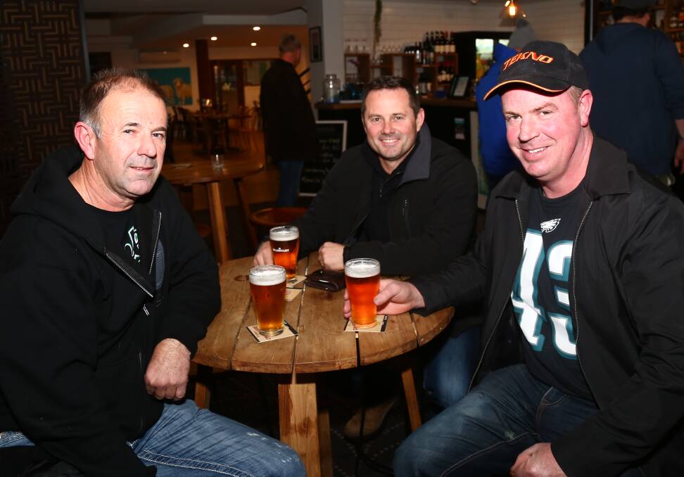 CHEERS: Richard Robb, Dave Browning and Matt Wolfe were at the Panorama Motel on Saturday. Photos: PHIL BLATCH 06107pbpan