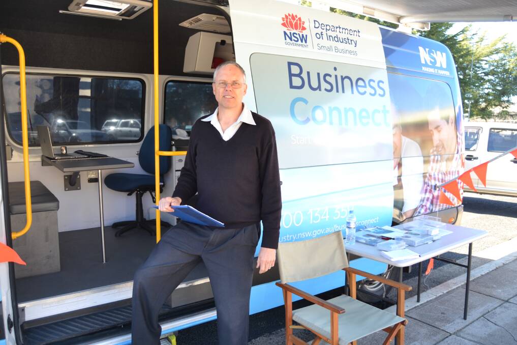 ADVISING: Business Connect adviser Russell Meadley with the NSW Government's Business Connect Bus. The bus in Bathurst on Thursday, in front of the court house. Photo: BRADLEY JURD
