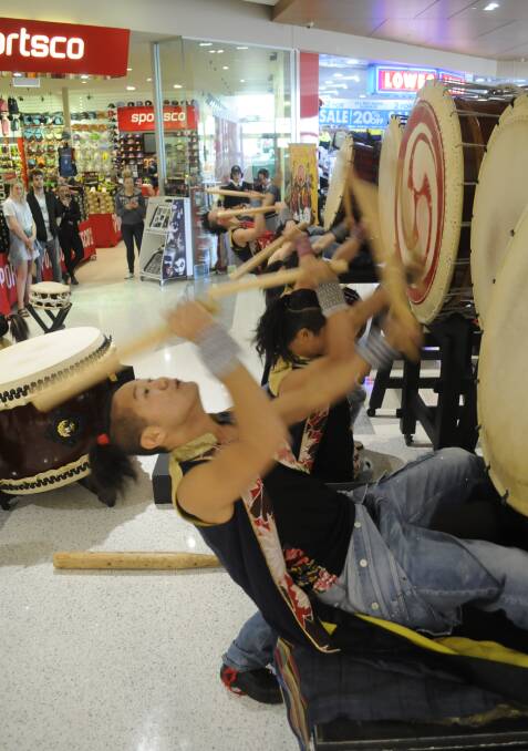 SHOWTIME: Some of the Yamato drummers from Japan were in action at the Bathurst City Centre on Wednesday afternoon. Photos: CHRIS SEABROOK 