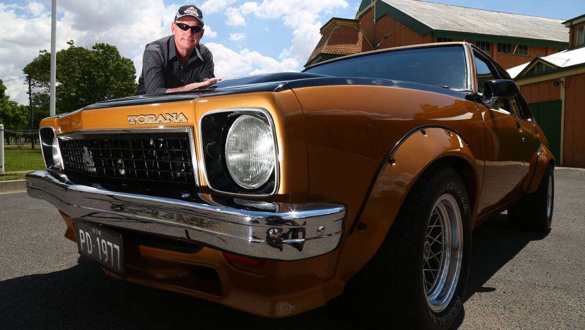 NICE WHEELS: A9X Torana Club of Australia secretary Peter Dixon with his classic car. The club's nationals event will held in Bathurst this year. 