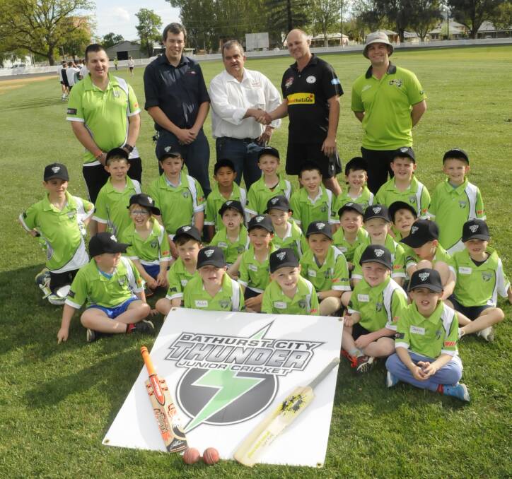 NEW BOYS: Bernardi representatives with coaches and players of Bathurst's newest cricket club, the Bathurst City Thunder. Photo: CHRIS SEABROOK 102616cthunder1
