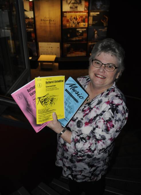 SHOWTIME: Bathurst Eisteddfod president Roslyn King with the eisteddfod booklets, ahead of the first performances on Saturday. Photo: CHRIS SEABROOK 082117ceist1