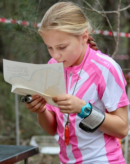 ORIENTEERING: Nea Shingler, from Sydney, in action during an orienteering event. She is a member of the NSW Orienteering school team. Photo: SUPPLIED