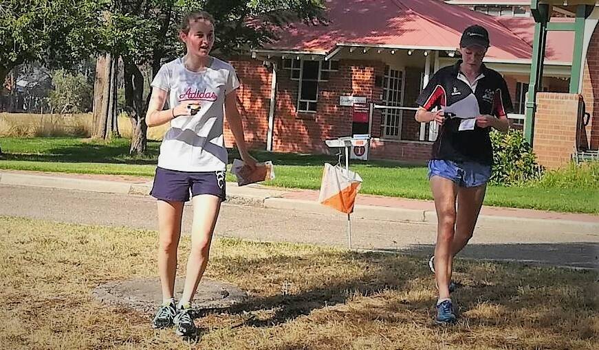 COMPETITIVE: Beatrice Humphries and Gabi Burge competed in Sunday's orienteering competition at Charles Sturt University. 