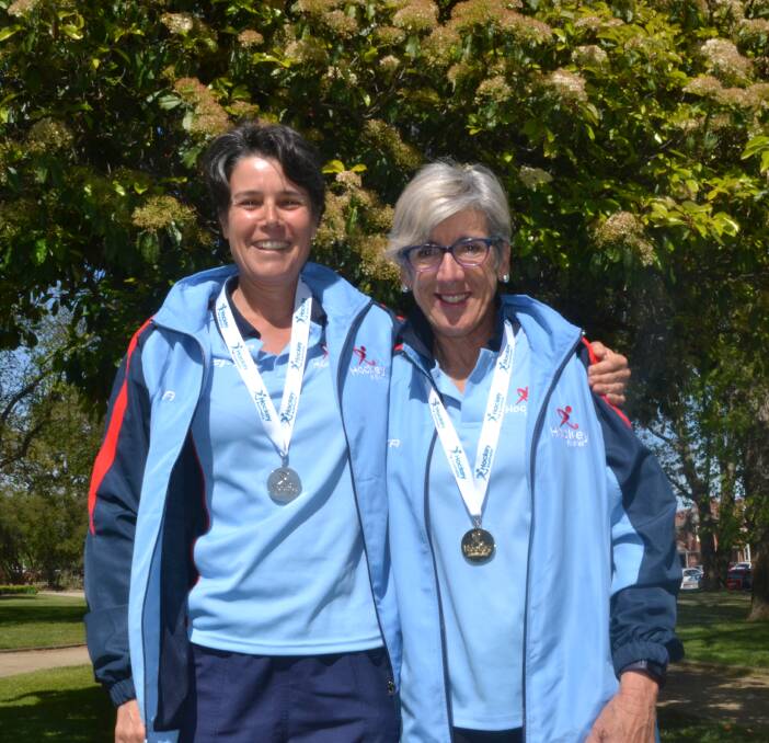 MEDAL WINNERS: Women's Masters Hockey over 50s silver medalist Sandra Hamer and over 60s gold medalist Wendy Hastings. Photo: BRADLEY JURD 102116bjhockey1