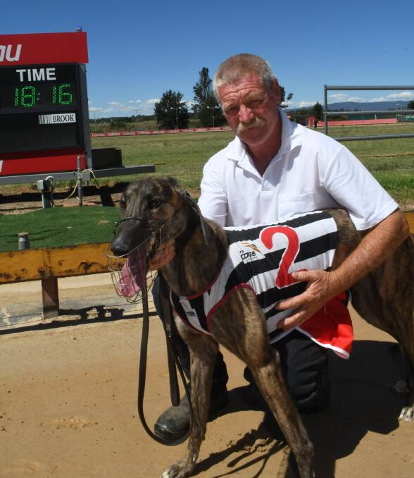 FIRST WIN OF THE YEAR: Mandurama trainer Stephen Cleary, with Extortionate who became the first winner at Kennerson Park in 2018. Photo: CHRIS SEABROOK 010118cdogs1c