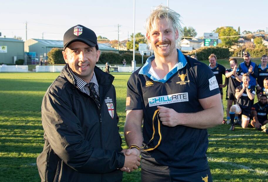 NSW Country Rugby Union president Luke Stephen presents Bathurst's Adam Plummer the Caldwell Cup final man of the match medal. Picture by Josh Brightman/Balanced Image Studio.