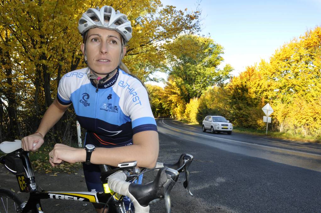 Toireasa Gallagher leaning on her bike near the Vale Road. Picture by Chris Seabrook
