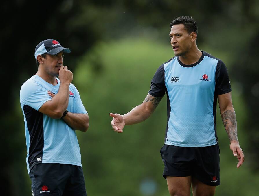 HAPPY CAMPERS: Tahs coach Daryl Gibson and Israel Folau are confident the central west camp will propel their side to a strong start.