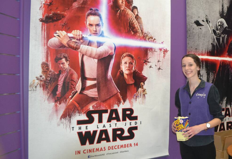 THE FORCE: Star Wars: The Last Jedi is set for a midnight screening at Bathurst Metro Cinemas. Pictured is staff member Phoebe Morrison. Photo: BRADLEY JURD