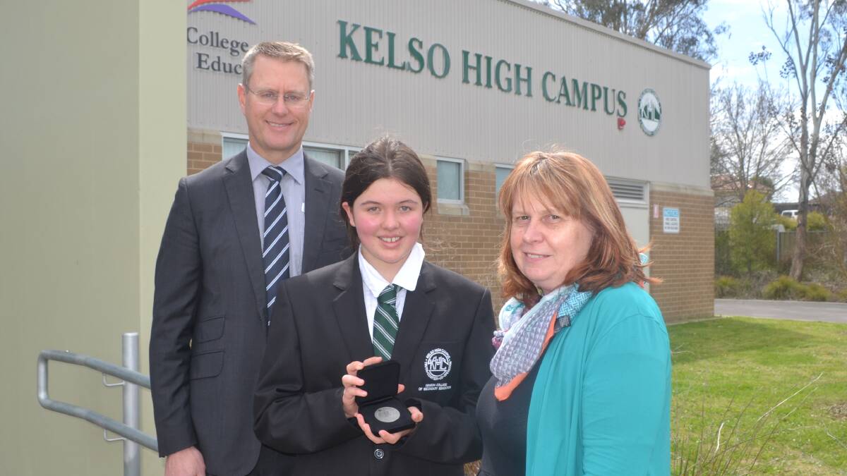 AWARD: Kelso High principal Michael Sloan, award-winner Maya McGrath and HSIE head teacher Sharon Mendes. Photo: BRADLEY JURD 092016bjkelso2