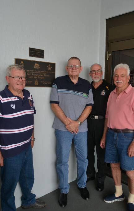 REFLECTION: Bathurst RSL subbranch president David Mills, John Graham, Brad Hock and Kevin McDiarmid in front in front of the RSL remembrance plaque. 