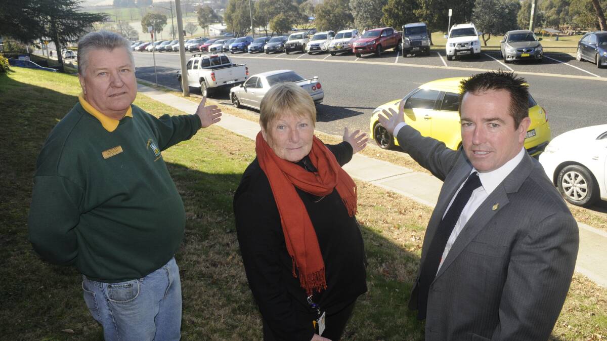 PARKING: Local resident Lachlan Sullivan, Bathurst Health Service general manager Sue Patterson and Member for Bathurst Paul Toole. Photo: CHRIS SEABROOK