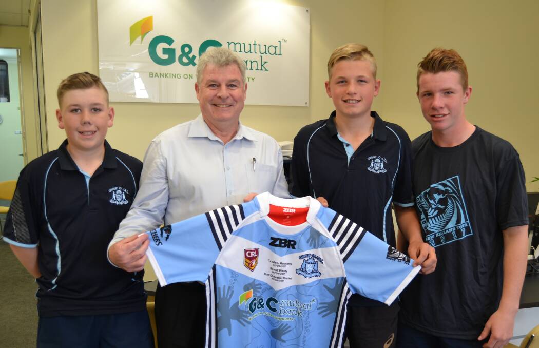 GAME ON: Cooper Earsman, G and C Mutual Bank local business manager David Irwin, team captain Myles Martin and Tallis Tobin. 
