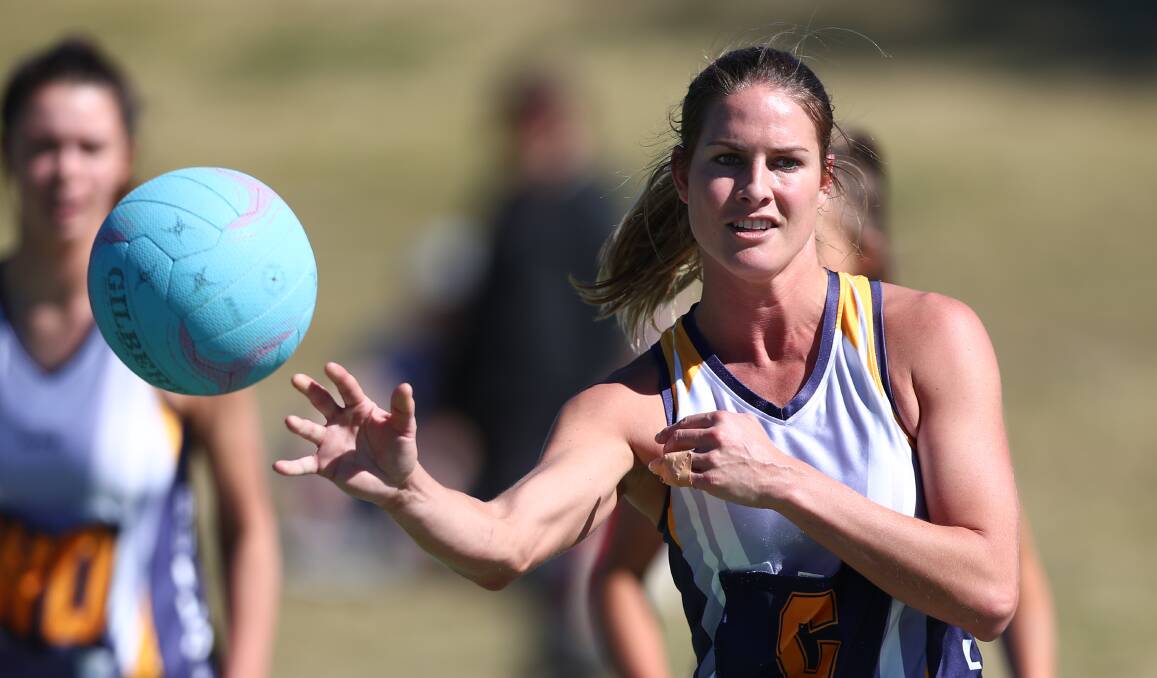 GAME ON: Bulldog Verdelho player Monique Lewis fires a pass in last week's game against Collegians Mystified. She will play a key roll in the midfield come Saturday. Photo: PHIL BLATCH 090917pbnet3