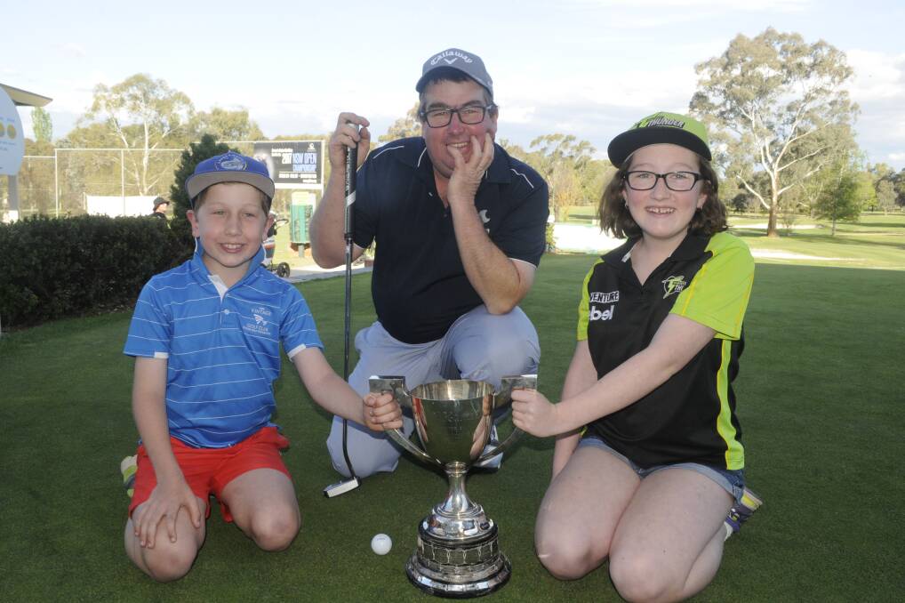 Bathurst Golf Open winner Mark Hale, pictured with son James and daughter Jasmine. Photo: CHRIS SEABROOK 1022176cgolf1