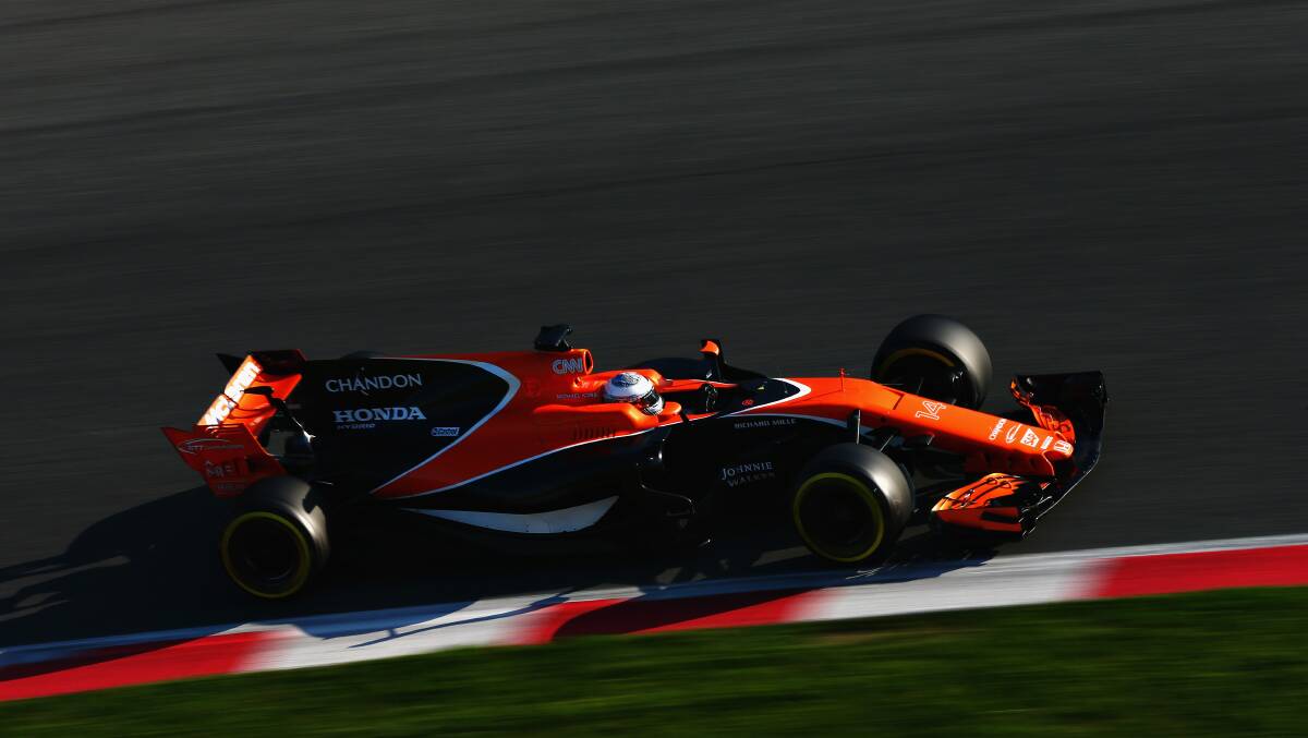 LET'S GO RACING: Fernando Alonso and the McLaren garage are hoping to feature on the podium this Formula 1 season after a disappointing 2016 campaign. Photo: GETTY IMAGES.