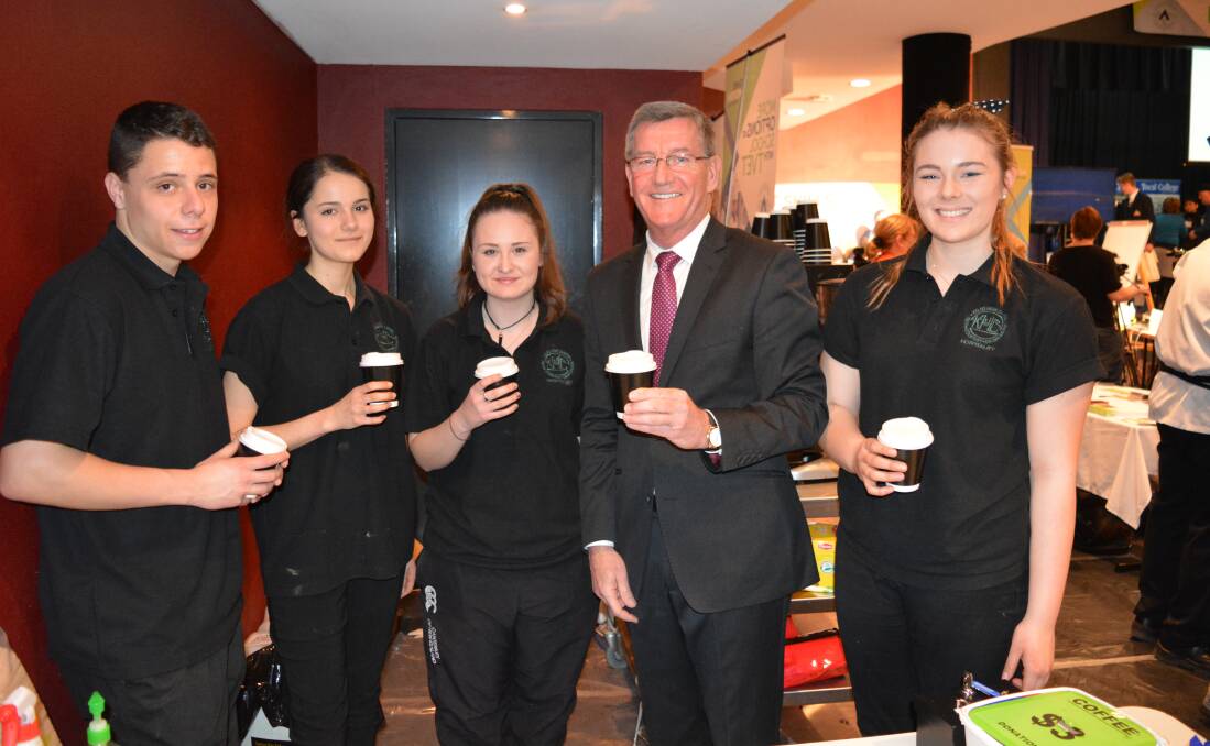 Cheers: Hospitality students from Denison College, Kelso Campus, Lachlan, Kayla, Deanna and Caroline joined by Mayor Gary Rush on a coffee break. 