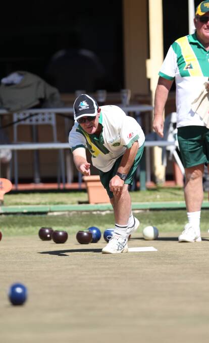 Tony Urza bowls watched by Daryl Bellamy  in the major minor pairs at Majellan bowls club. Pic Phil Blatch.