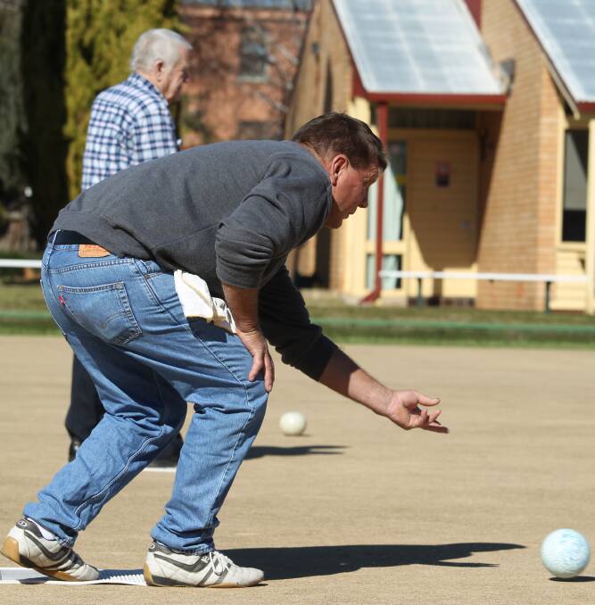 SUNNY DAY: Dave Josh enjoys one of the warmer days of winter thus far while bowling at Majellan on Saturday. Photo: PHIL BLATCH 073016pbbowls1.