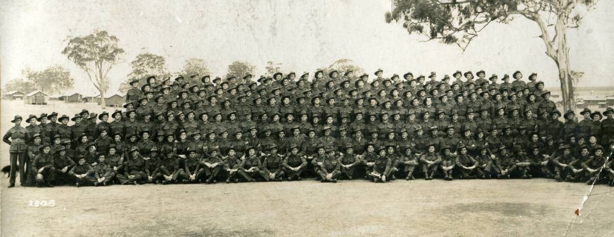 MEN IN UNIFORM: Peter Wellington (first row, second left) with the 2/19 Headquarters Company platoon at Ingleburn. The soldiers were later to be transported to Bathurst.
