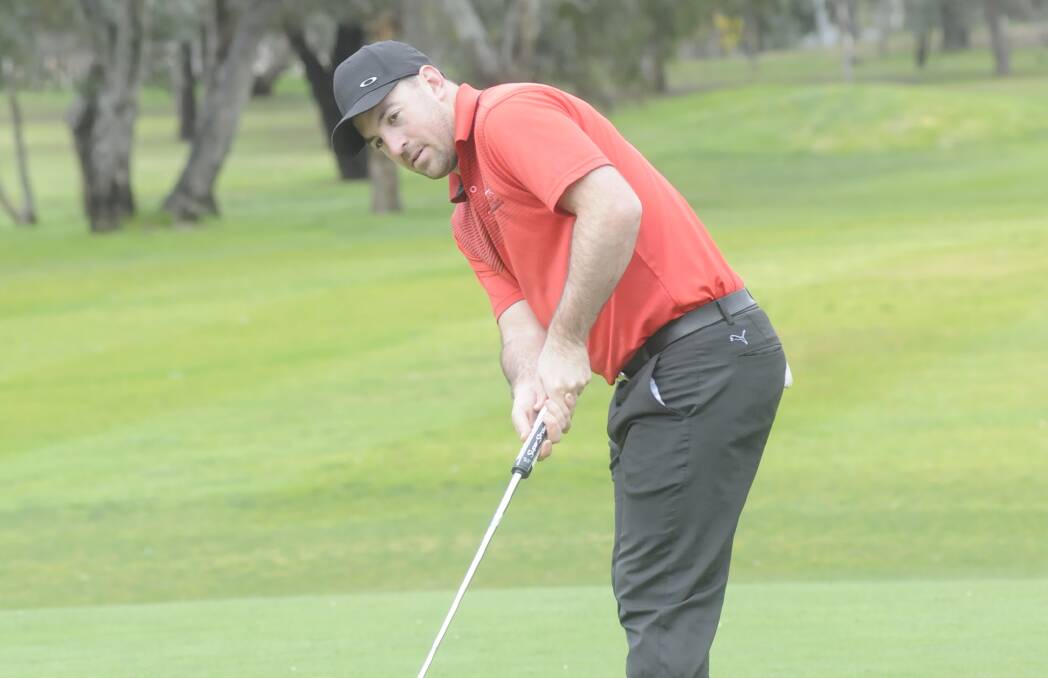 I'M AN INDIVIDUAL: Mitchell Bestwick putts on the 18th hole during an individual Stableford at the Bathurst Golf Club last week. Photo:CHRIS SEABROOK 090416cgolf1.