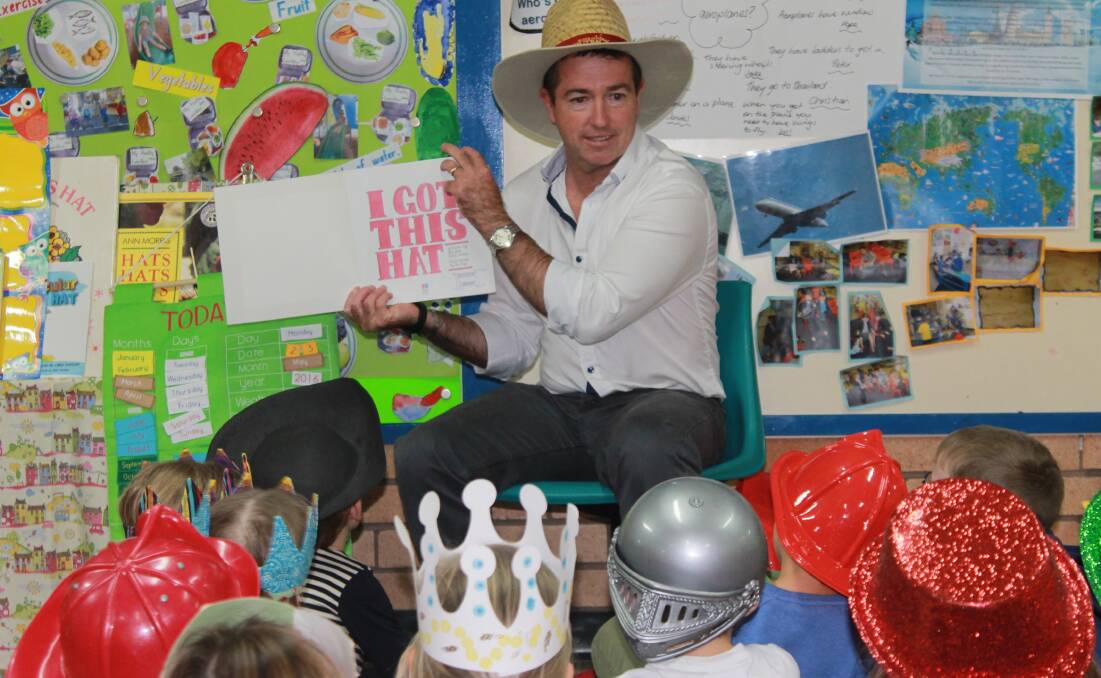 GOOD READ: Member for Bathurst Paul Toole with the Pathfinders pre-school class at Elizabeth Chifley.