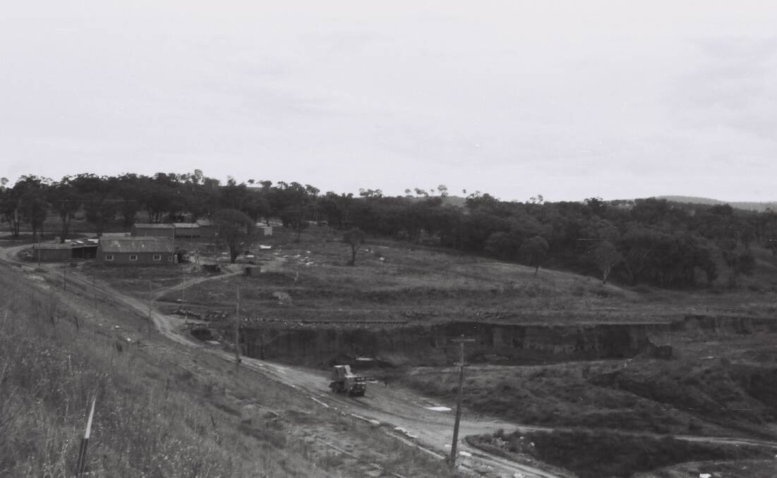 Beginnings: This week’s photo shows the site of Chifley Dam with the workmen’s camp and workshops towards the top and major construction works underway lower down