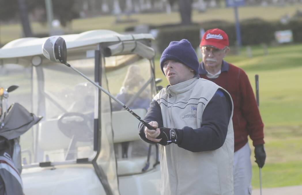 OUT IN THE COLD: Scott Bennett tees off from the seventh in a recent round at the Bathurst Golf Club. Photo: CHRIS SEABROOK 061116cgolf7a