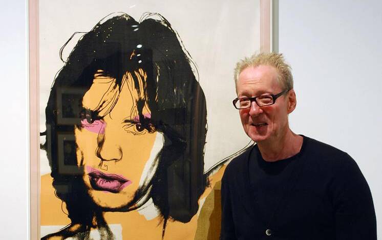 Talk of the Town: Richard Perram in front of Andy Warhol’s, Mick Jagger, 1975.  Photographic Screen print on Arches Aquarelle Paper.