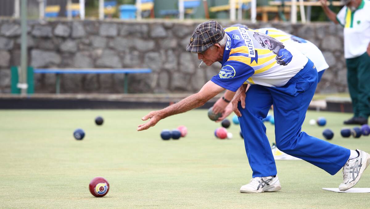 Looking Good: Mick Sewell sends one down in his Saturday singles match at the Bathurst City Bowling Club. Photo: PHIL BLATCH.