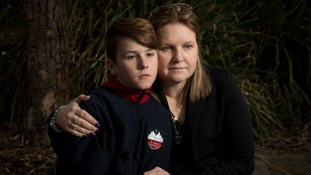 "This is emotional abuse": Natalie Wykes with her son, Kynan. Photo: Janie Barrett