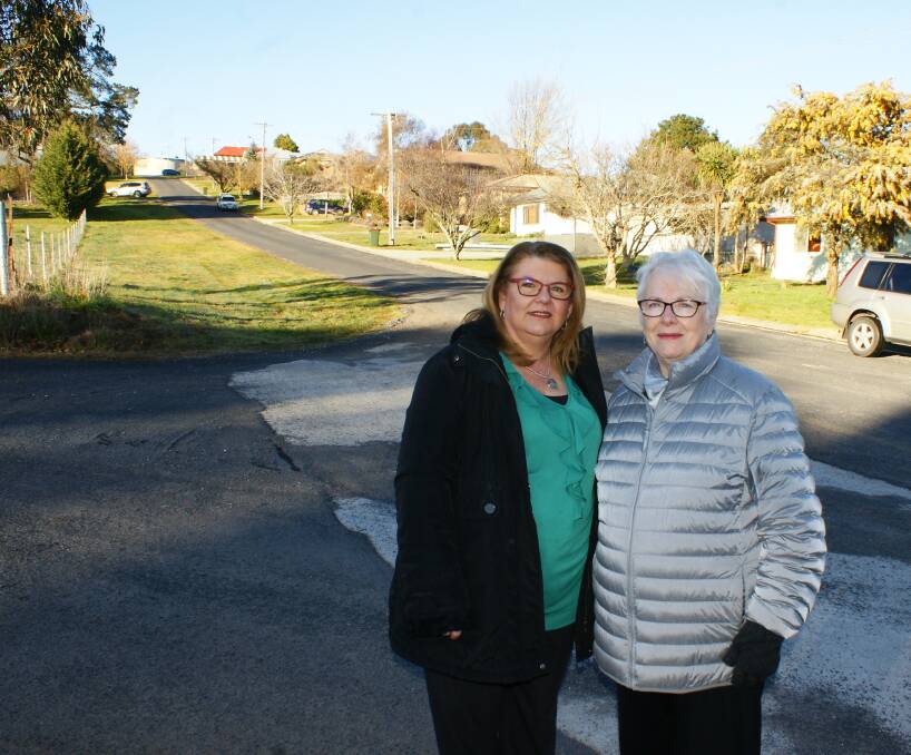 TRAFFIC DANGER: Millthorpe residents Fiona Ivancsik and Ann Harrison in front of the verge proposed for parking as part of a childcare centre on George Street. Photo: MARK LOGAN 0816mlchildcare1