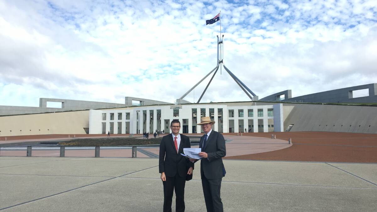 AT THE GATE: Charles Sturt University vice-chancellor Professor Andrew Vann and member for Calare Andrew Gee at Parliament House on Tuesday. 