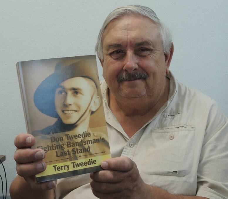 Terry Tweedie with his newly published book on father Don, prisoner of war, father of five and member of Forbes Town Band from 1962 to 2007. Terry was in Forbes last week for his mum Theo's 90th birthday.