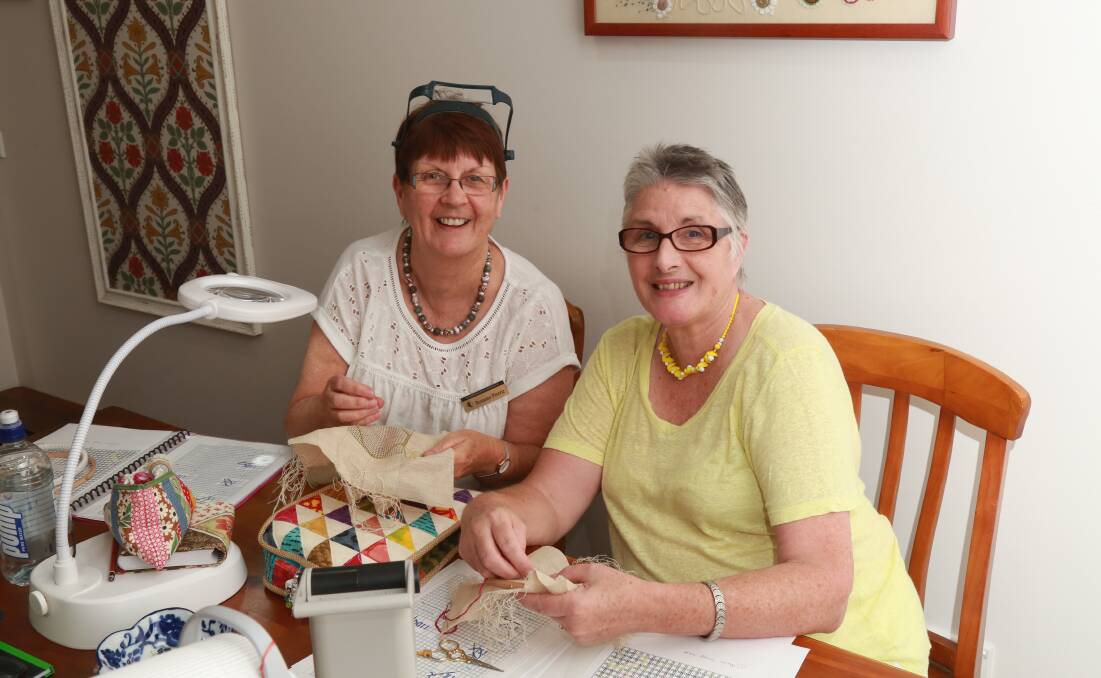SNAPSHOT: Roxanne Peterie from Dubbo joined Lorraine Fry at a Bathurst Embroidery Guild event held at Kelso on Saturday. Photo: PHIL BLATCH