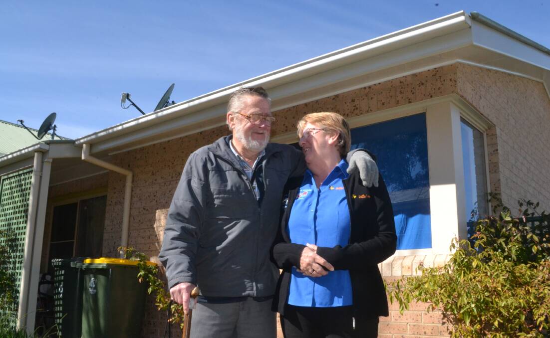 SAFE AND SOUND: Stewart, who has a history of homelessness but is now living in a unit in Kelso, with Carol McManus of Wattle Tree House. 081017wattle