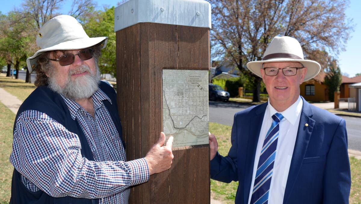 LOOKING BACK: Historian Robin McLachlan and mayor Graeme Hanger. New signs mark two of the corners of Macquarie’s original 1815 town plan for Bathurst