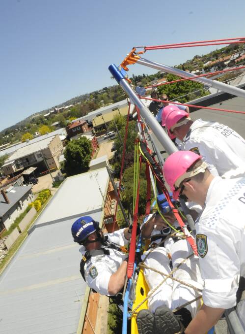 ALMOST THERE: The Western Region Police Rescue Squad trains above the Bathurst CBD this week. Photo: CHRIS SEABROOK