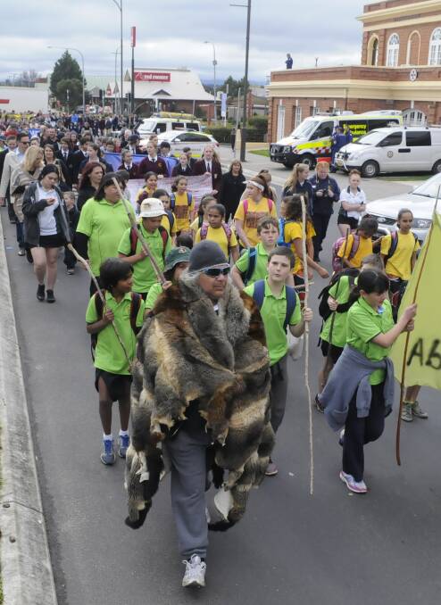 PROUD: The NAIDOC march in William Street. Photo: CHRIS SEABROOK 091916cnaidoc1
